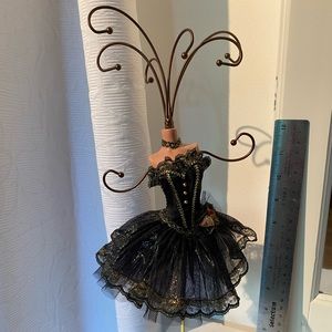 Black ballerina figurine necklace holder.  8 hangers.